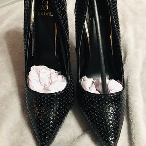 Black Stilettos with Indented Pattern.